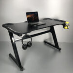 Gaming table, Gaming desk, Gaming workstation desk, PC gaming desk, Computer gaming table, Gamer desk setup, Gaming table with LED lights, RGB gaming desk, Gaming desk with cup holder, Gaming desk with headphone hook, Ergonomic gaming desk, Adjustable gaming desk, Height adjustable gaming table, Electric gaming desk, Standing gaming desk, Sit stand gaming desk, L shaped gaming desk, Corner gaming desk, U shaped gaming desk, Gaming Table Nairobi Kenya, Buy Gaming Table Nairobi Kenya, Affordable Gaming Table Nairobi Kenya, RGB Gaming Desk Nairobi Kenya, LED Gaming Table Nairobi Kenya, Professional Gaming Desk Nairobi Kenya, Home Office Gaming Table Nairobi Kenya, Computer Gaming Desk Nairobi Kenya, Corner Gaming Table Nairobi Kenya, Large Gaming Desk Nairobi Kenya, Gaming Table Mombasa Kenya, Buy Gaming Table Mombasa Kenya, Affordable Gaming Table Mombasa Kenya, RGB Gaming Desk Mombasa Kenya, LED Gaming Table Mombasa Kenya,