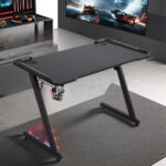 Gaming table, Gaming desk, Gaming workstation desk, PC gaming desk, Computer gaming table, Gamer desk setup, Gaming table with LED lights, RGB gaming desk, Gaming desk with cup holder, Gaming desk with headphone hook, Ergonomic gaming desk, Adjustable gaming desk, Height adjustable gaming table, Electric gaming desk, Standing gaming desk, Sit stand gaming desk, L shaped gaming desk, Corner gaming desk, U shaped gaming desk, Gaming Table Nairobi Kenya, Buy Gaming Table Nairobi Kenya, Affordable Gaming Table Nairobi Kenya, RGB Gaming Desk Nairobi Kenya, LED Gaming Table Nairobi Kenya, Professional Gaming Desk Nairobi Kenya, Home Office Gaming Table Nairobi Kenya, Computer Gaming Desk Nairobi Kenya, Corner Gaming Table Nairobi Kenya, Large Gaming Desk Nairobi Kenya, Gaming Table Mombasa Kenya, Buy Gaming Table Mombasa Kenya, Affordable Gaming Table Mombasa Kenya, RGB Gaming Desk Mombasa Kenya, LED Gaming Table Mombasa Kenya,