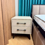 bedside cabinet, bedside table, nightstand, night table, bedroom cabinet, bedroom storage, bedside drawers, modern bedside cabinet, wooden bedside table, white bedside cabinet, black bedside table, bedside cabinet with drawers, small bedside table, compact nightstand, luxury bedside cabinet, affordable bedside table, bedside cabinet Kenya, Nairobi bedside table, Built with durable materials such as engineered wood, MDF, or solid wood, bedside cabinets are designed to last while complementing a wide range of bedroom décor styles. Many models feature spacious drawers, open shelves, and smooth finishes, making them ideal for both storage and display. Additionally, their compact design ensures they fit seamlessly even in smaller bedrooms, making them a popular choice across homes in Kenya.