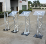 podium, lectern, podium stand, lectern stand, presentation podium, speaker podium, conference podium, church podium, school podium, office podium, public speaking podium, professional podium, modern podium, wooden podium, metal podium, acrylic podium, portable podium, adjustable podium, standing podium, floor podium, presentation stand, speaker stand, speech podium, lecture podium, teaching podium, classroom podium, training podium, seminar podium, meeting podium, conference lectern, presentation lectern, church lectern, pulpit podium, pulpit stand, church pulpit, school lectern, teacher podium, teacher lectern, lecturer podium, lecturer stand, university podium, college podium, institutional podium, corporate podium, business podium, executive podium, office lectern, meeting lectern, conference lectern stand, event podium, event lectern, ceremony podium, graduation podium, wedding podium, function podium, event presentation stand, public address podium, microphone podium, podium with microphone, microphone lectern, speech stand, speaker lectern, presenter podium, presenter stand, presentation furniture, conference furniture, office presentation furniture, classroom furniture, school furniture, university furniture, college furniture, training room furniture, seminar furniture, boardroom podium, boardroom lectern, meeting room podium, meeting room lectern, conference room podium, conference room lectern, auditorium podium