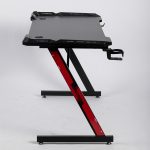 gaming table, gaming desk, gaming desk table, gamer desk, gaming workstation, gaming computer desk, gaming PC desk, gaming setup desk, gaming station, gaming workstation desk, gamer workstation, computer gaming table, gaming table Kenya, gaming desk Kenya, gamer desk Kenya, gaming furniture Kenya, gaming workstation Kenya, gaming table for home, gaming desk for home, home gaming desk, home gaming table, modern gaming desk, modern gaming table, professional gaming desk, professional gaming table, premium gaming desk, luxury gaming desk, affordable gaming desk, quality gaming desk, durable gaming desk, sturdy gaming desk, ergonomic gaming desk, ergonomic gaming table, comfortable gaming desk, large gaming desk, spacious gaming desk, compact gaming desk, small gaming desk, wide gaming desk, long gaming desk, corner gaming desk, L shaped gaming desk, straight gaming desk, minimalist gaming desk, contemporary gaming desk, stylish gaming desk, sleek gaming desk, RGB gaming desk, LED gaming desk, gaming desk with LED lights, gaming desk with RGB lights, gaming desk with storage, gaming desk with drawers, gaming desk with shelves, gaming table with storage, gaming table with drawers, gaming table with shelves, gaming desk organizer, gaming desk setup, gaming setup furniture, gaming room furniture, gaming room desk, gaming room table, gamer room desk, gamer room furniture, PC gaming desk, computer desk for gaming, desktop gaming desk, monitor desk, monitor gaming desk, dual monitor gaming desk, triple monitor gaming desk, multiple monitor desk, wide monitor desk, gaming desk for dual monitors, gaming desk for PC setup, gaming desk for console, console gaming desk, PlayStation gaming desk, Xbox gaming desk, Nintendo gaming desk, esports gaming desk, esports workstation, streamer desk, streaming desk, content creator desk, gaming streamer desk, gaming studio desk, gaming office desk, gaming work desk, gaming study desk, gaming desk for students, gaming desk for teenagers, gaming desk for adults, gaming desk for kids, gaming desk with cable management, cable management gaming desk, wire management gaming desk, computer gaming workstation, home office gaming desk, office gaming desk,